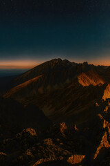 Mountain At Night Under A Starry Sky. Generative ai
