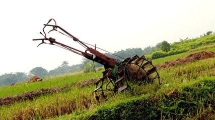 Fototapeta premium Old Tractor in Field
