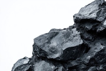 Vibrant Color Image of Raw Sample of Black Lava Stone Stone Close Up on White Background