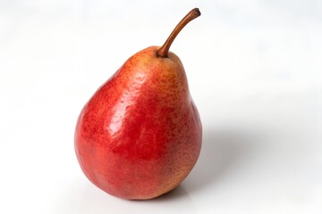 Single red pear on white background