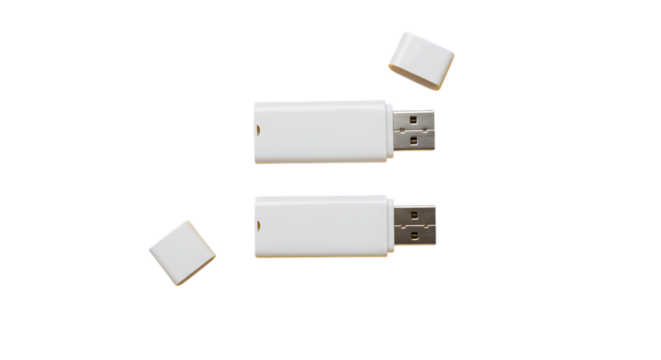 Two white usb flash drives with caps isolated on transparent background