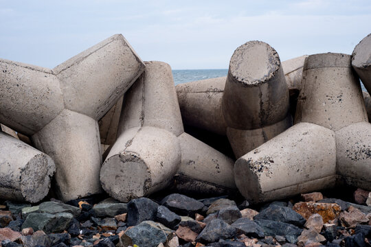 Bai da ong dia beach with tetrapods on the beach against the blue sky Mui Ne, Vietnam.