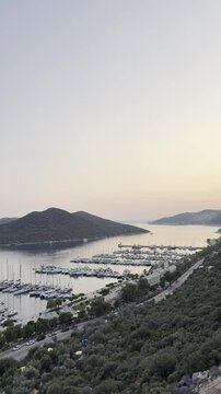 Yacht Marina in Kas, T&uuml;rkiye at Sunset from Above (Vertical)