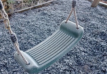 Child's swing in the frost