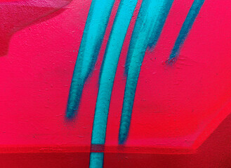 Beautiful colorful street art graffiti background. The wall is decorated with abstract drawings house paint. Modern style urban culture of street youth. Abstract picture on wall