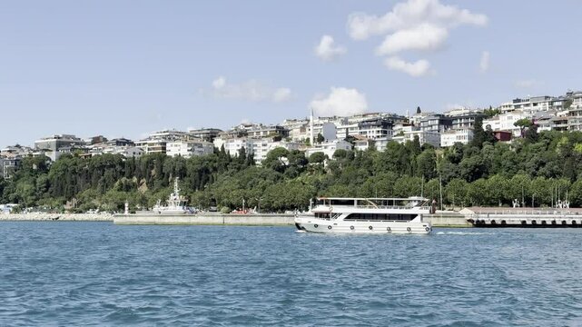 Houses overlooking the Bosphorus, view from a boat (horizontal)