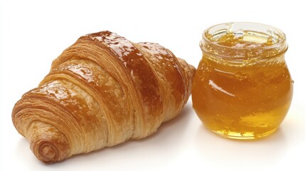 Freshly Baked Croissant with Honey Jar on a White Background