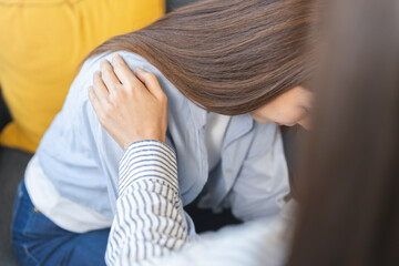 Psychology depression. Sad asian young woman consulting with psychiatrist while patient counseling...