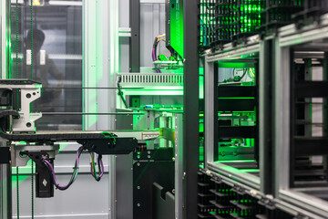 Automated industrial storage system with green light, Smart warehouse automation modern storage and...