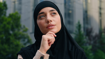 Muslim woman in hijab Islamic Arabian businesswoman Islam ethnic business female girl looking for...