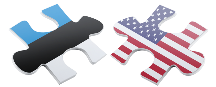 Two puzzle pieces representing Estonia and the United States are shown against a black background, symbolizing partnership and connection between the two nations.