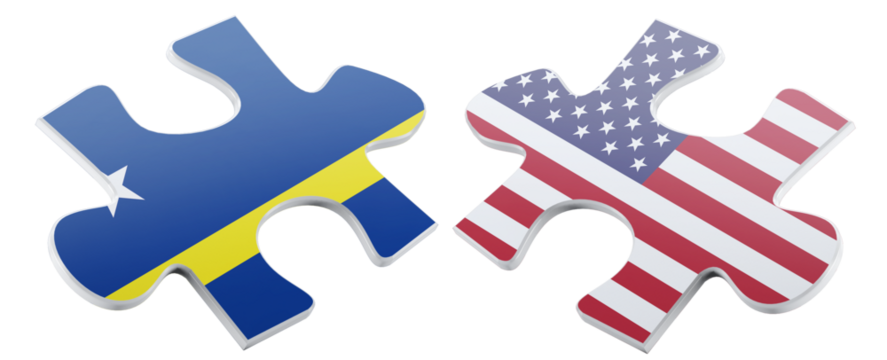 Two jigsaw puzzle pieces, symbolizing international connections, feature the flag of Curacao alongside the United States flag, conveying a message of unity and cooperation.
