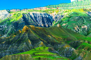 Picturesque mountain landscape of green mountain slope with erosion. Caucasus