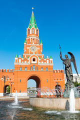 Monument-fountain Archangel Gabriel against the background of the Annunciation Tower in Yoshkar-Ola. Russia