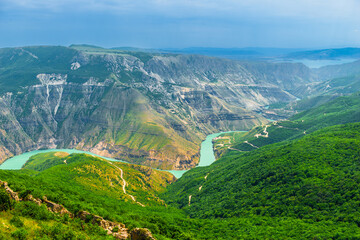 Picturesque landscape with a bend of an azure river in a deep mountain canyon. Sulak. Caucasus