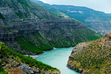Picturesque landscape of the azure mountain river Sulak in a beautiful canyon of the Caucasian mountains of Dagestan. Russia