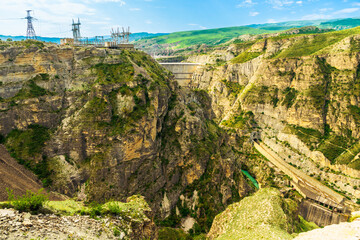 Stunning view of the Chigriyskaya hydroelectric power station on the mountain river Sulak in the mountains of the North Caucasus of Dagestan. Russia