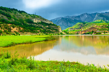 Dramatic landscape of a picturesque mountain lake in pre-storm weather on the Dagestan highlands. North Caucasus. Russia