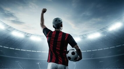 Soccer player celebrates victory stadium lights shine bright unforgettable moment - Powered by Adobe
