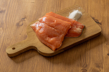 Salmon Fillets on Chopping Board