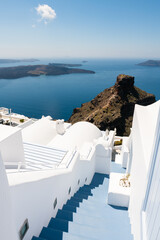 White architecture in Santorini island, Greece. Stairs to the sea. Beautiful seascape at sunny day.