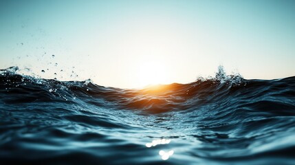 A breathtaking view of waves gently rolling in at sunrise, capturing the serene beauty of nature as the sun begins to rise over the horizon, illuminating the water.