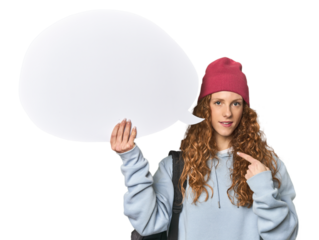 Redhead holding a comic speech bubble person pointing by hand to a shirt copy space, proud and confident