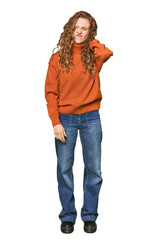 Full-body redhead portrait suffering neck pain due to sedentary lifestyle.