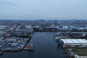 Fototapeta premium Aerial view of industrial canals and port area in Kawasaki, Japan
