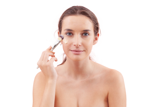 Smiling young woman with natural skin applying foundation with a makeup brush, visible streak on cheek. Skincare and beauty routine concept. Isolated on white background, clean and minimal look