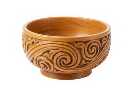 Ornate wooden bowl showcases intricate swirl patterns, bathed in soft light for a classic aesthetic.