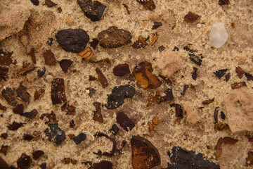 Closeup, abstract details of colorful sand and rock, mineral-rich formations in the Colored Sands...