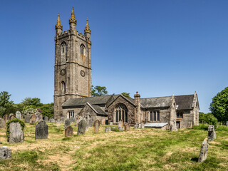 St Pancras Church, Widecombe in the Moor, Dartmoor, Devon, on a beautiful summer day with clear blue sky.