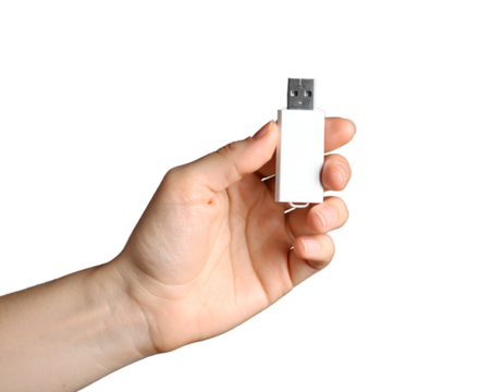A hand holding a white USB flash drive, symbolizing data storage and transfer. - Powered by Adobe