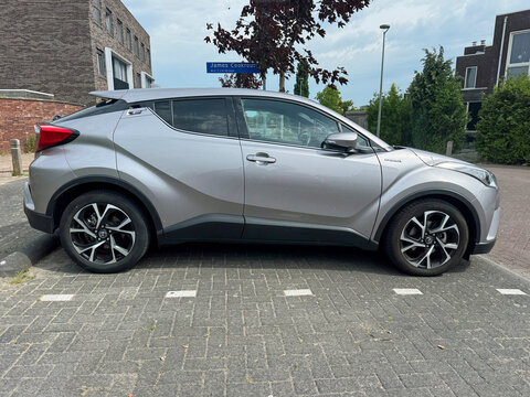Almere, the Netherlands - June 22, 2025: Toyota C-HR parked on a public parking lot. Nobody in the vehicle. 