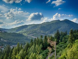 Scenic View of the Carpathian Mountains Covered by Clouds on a Sunny Day