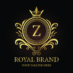 Golden shield vector emblem with crown and ribbon, a vintage award design element LOGO Z