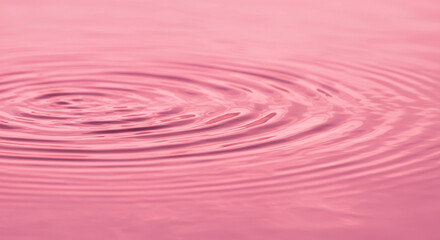 Pink Water Surface with Ripples: A Close-Up Study of Texture and Abstraction