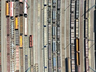 a freight station with many trains - aerial view