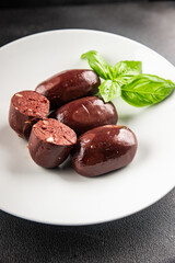 Black pudding sausage fresh delicious gourmet food background on the table rustic food top view copy space
