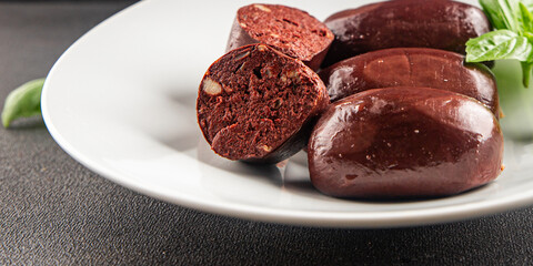 Black pudding sausage fresh delicious gourmet food background on the table rustic food top view copy space