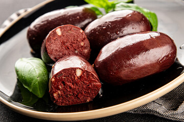 Black pudding sausage fresh delicious gourmet food background on the table rustic food top view copy space