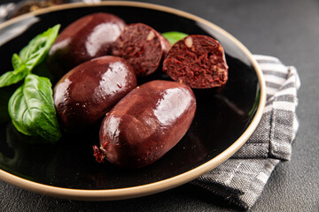 Black pudding sausage fresh delicious gourmet food background on the table rustic food top view copy space
