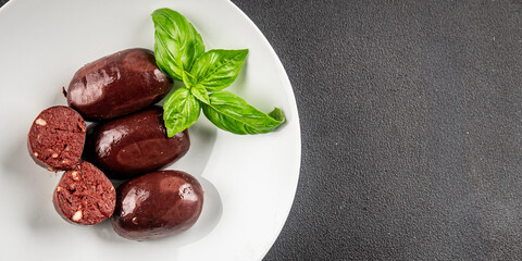 Black pudding sausage fresh delicious gourmet food background on the table rustic food top view copy space