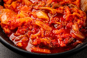 Kimchi pickled cabbage salad spicy savory vegetables fresh delicious gourmet food background on the table rustic food top view copy space vegetarian and vegan food