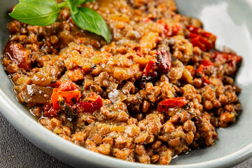 Lentil dish vegetables and roasted peppers savory vegetable fresh vegetarian and vegan food gourmet food background on the table rustic food top view copy space keto and paleo diet