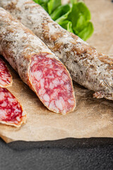 Dry-cured sausage pork meat smoked food fresh delicious gourmet food background on the table rustic food top view copy space