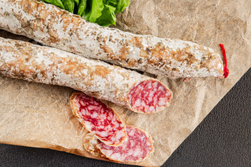 Dry-cured sausage pork meat smoked food fresh delicious gourmet food background on the table rustic...
