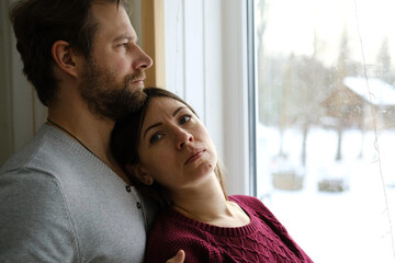 Mature couple hugging hugging each other kissing at home bedroom. Intimate Moment. Tender embrace...