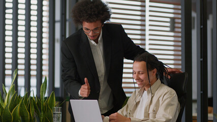 American ethnic businessman business worker trainee working laptop office African leader boss...